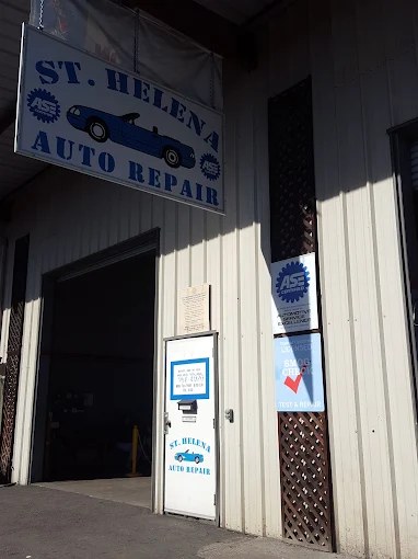 The blue and white St. Helena Auto Repair sign above the shop entrance.